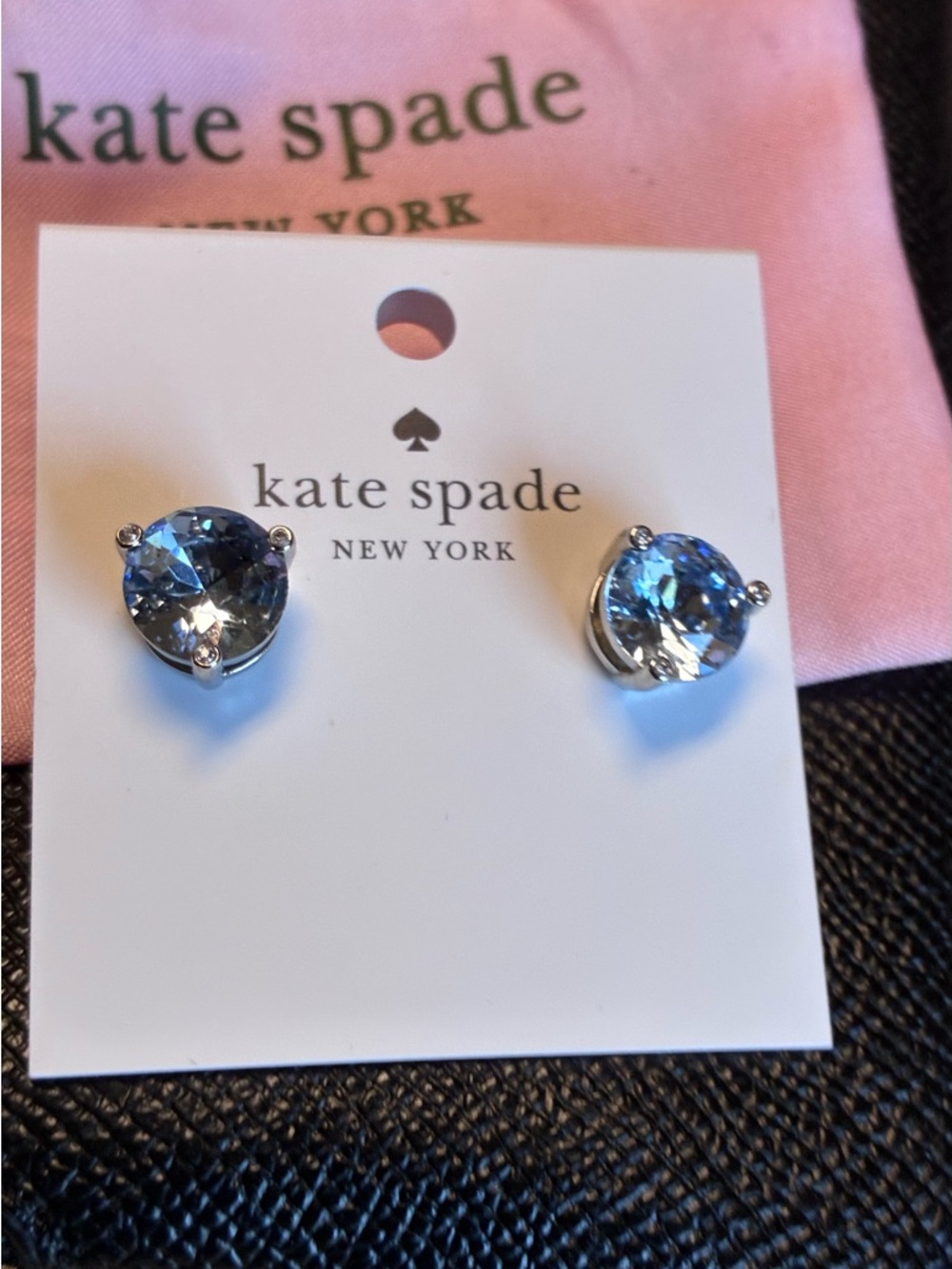 Kate Spade New York Brilliant Statements stud earrings, in a light blue shade.